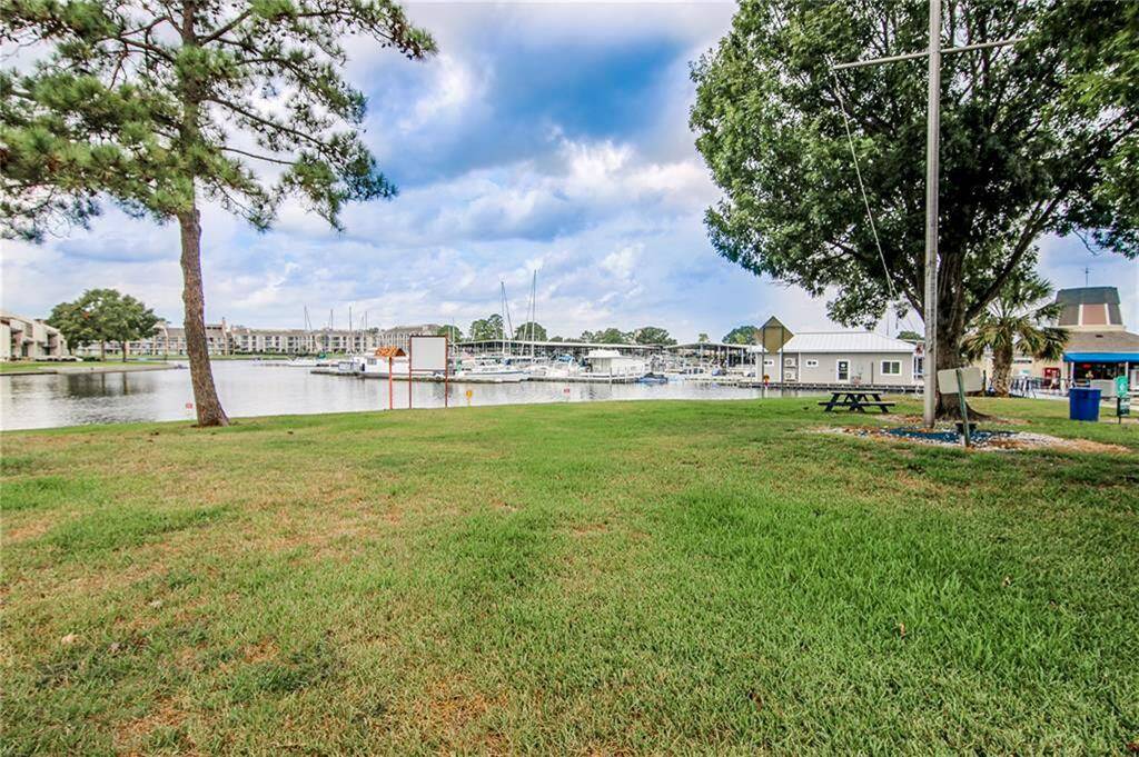 Just down from your unit you can walk thru the gate and access the marina and lake. You can even have a picnic if you wish.