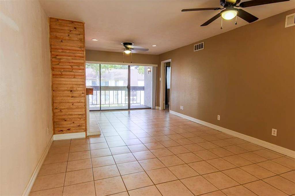 As you enter the condo your greeted with the family room and then sliding glass door to the balcony.