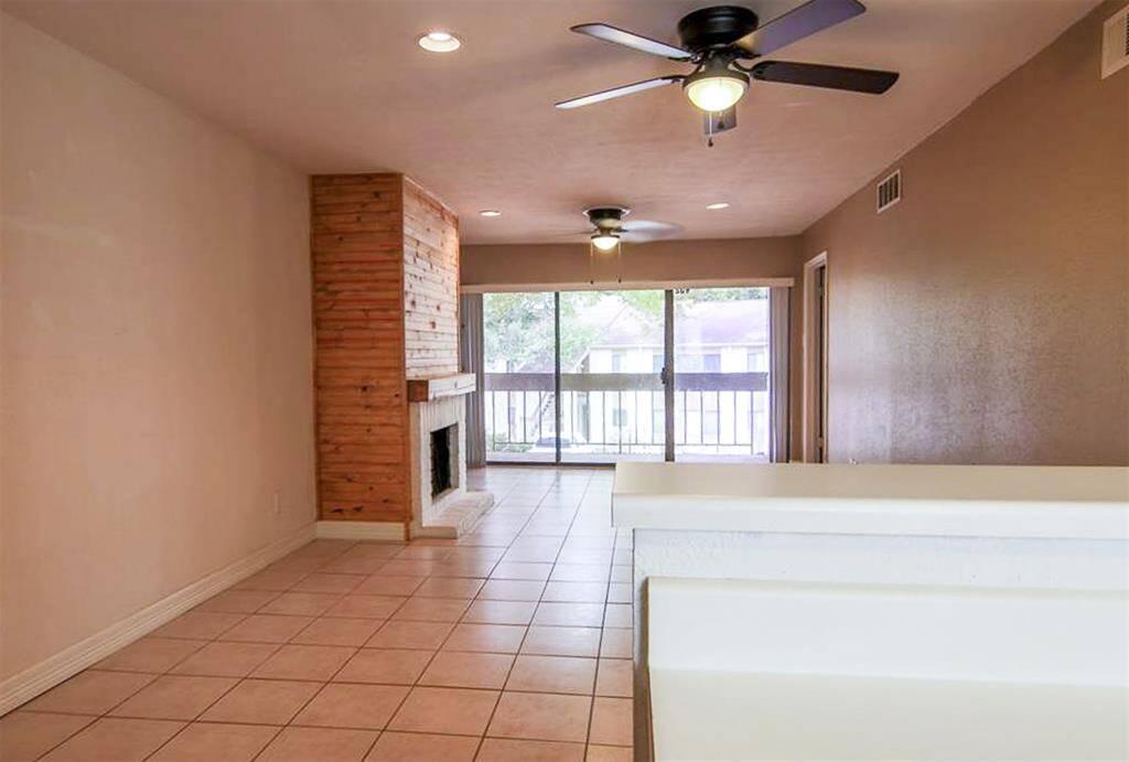 View from the kitchen into dining & living space.