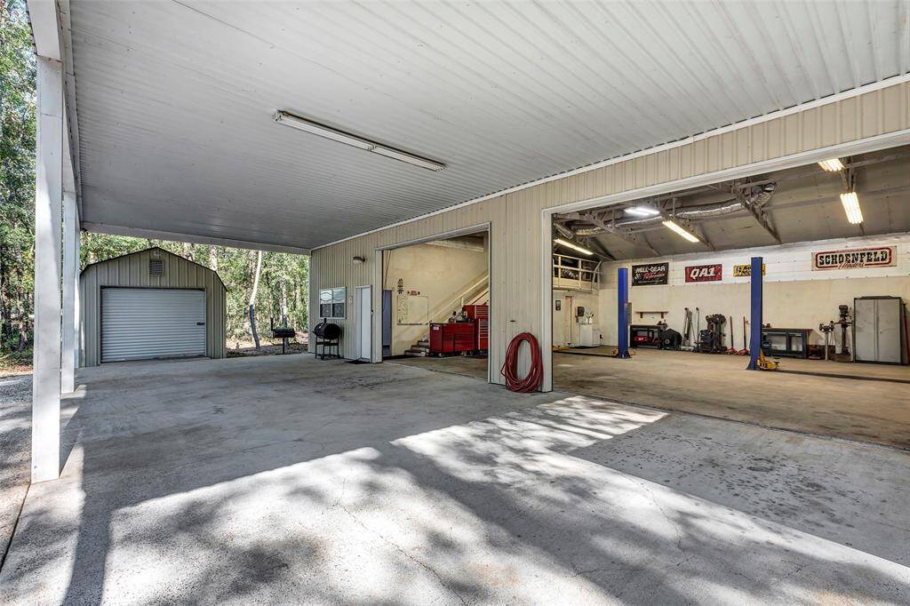 Awning over shop w/RV Parking