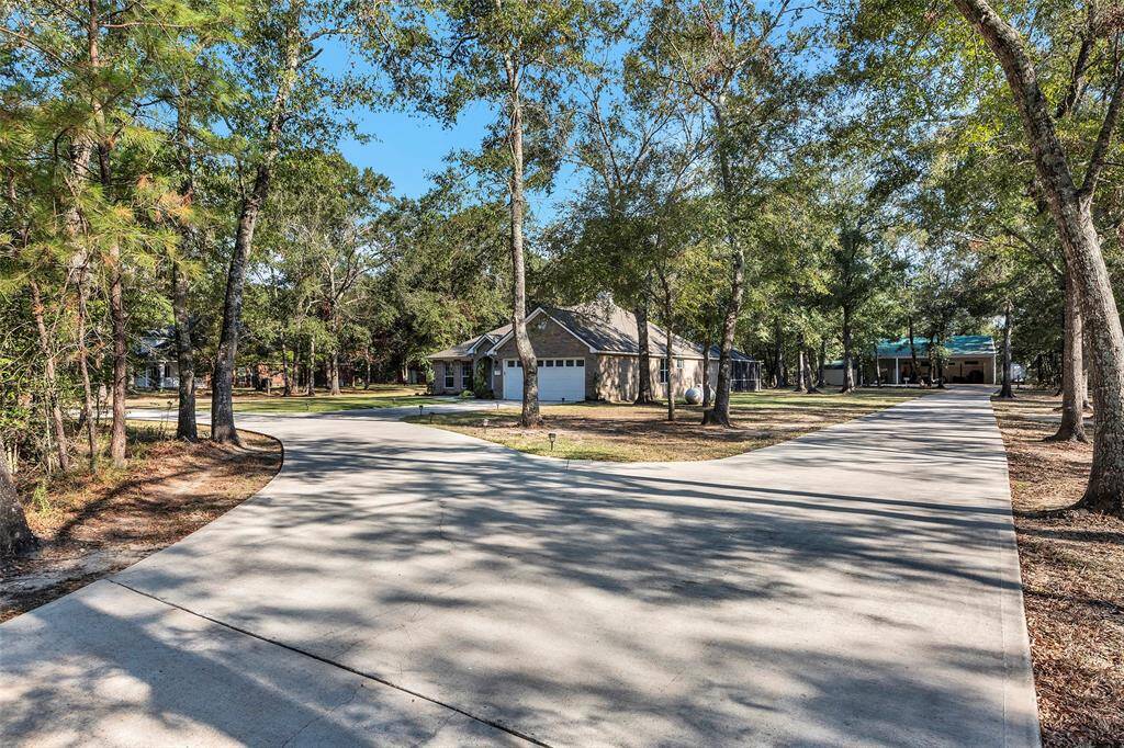 Circular Driveway in front of house + private driveway to shop