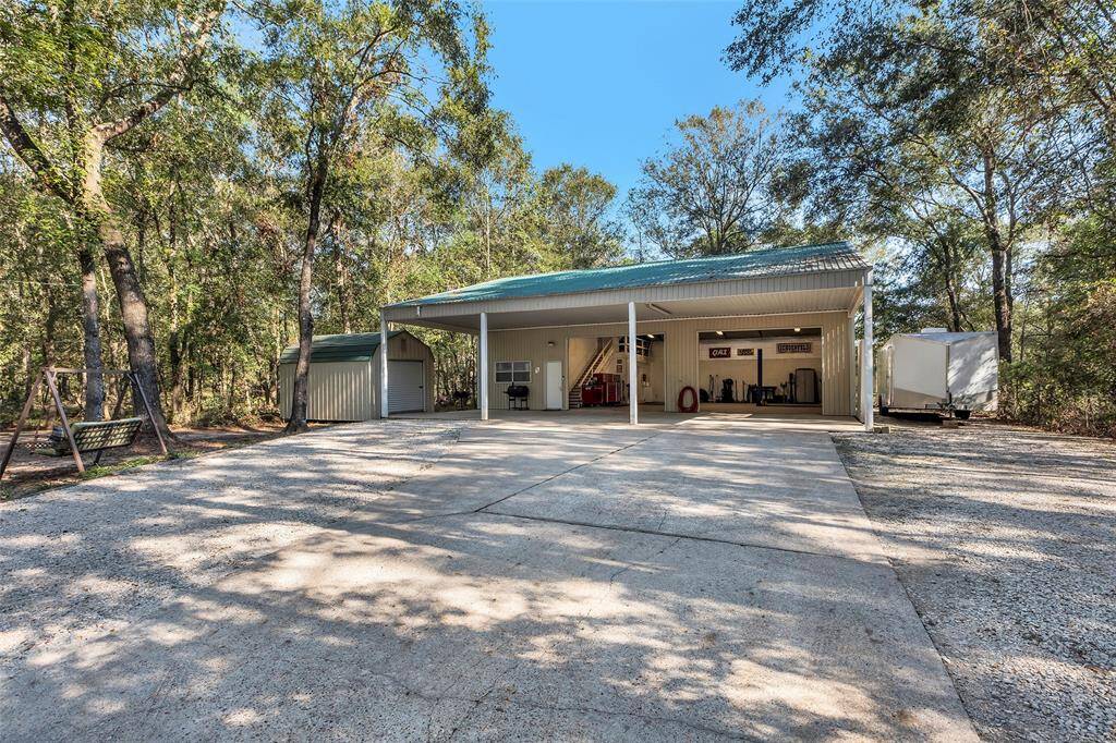 View of AC/Heated shop and private driveway to shop