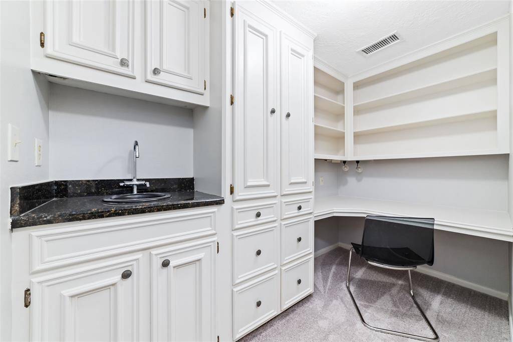 Stunning and spacious dining room features recently refinished wood flooring, beautiful accent paint and large windows bringing in tons of natural light.