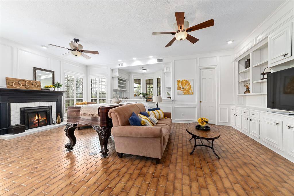 Another view of the dining room which features high ceilings and double doors leading to the chef's kitchen. Great floor plan for entertaining!
