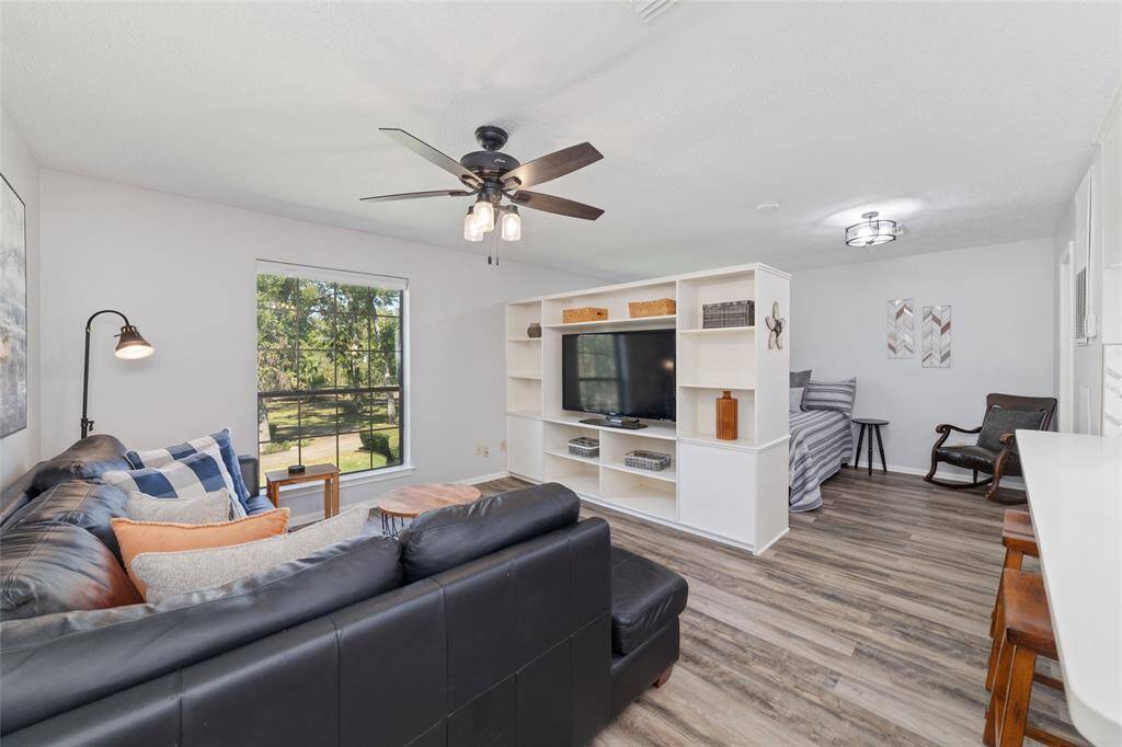 Garage Apartment is located above the 2 car garage and has been recently updated. Features a kitchen, living area, sleeping area, full bathroom and beautiful luxury vinyl plank flooring. Beautiful views of the property from the large windows.