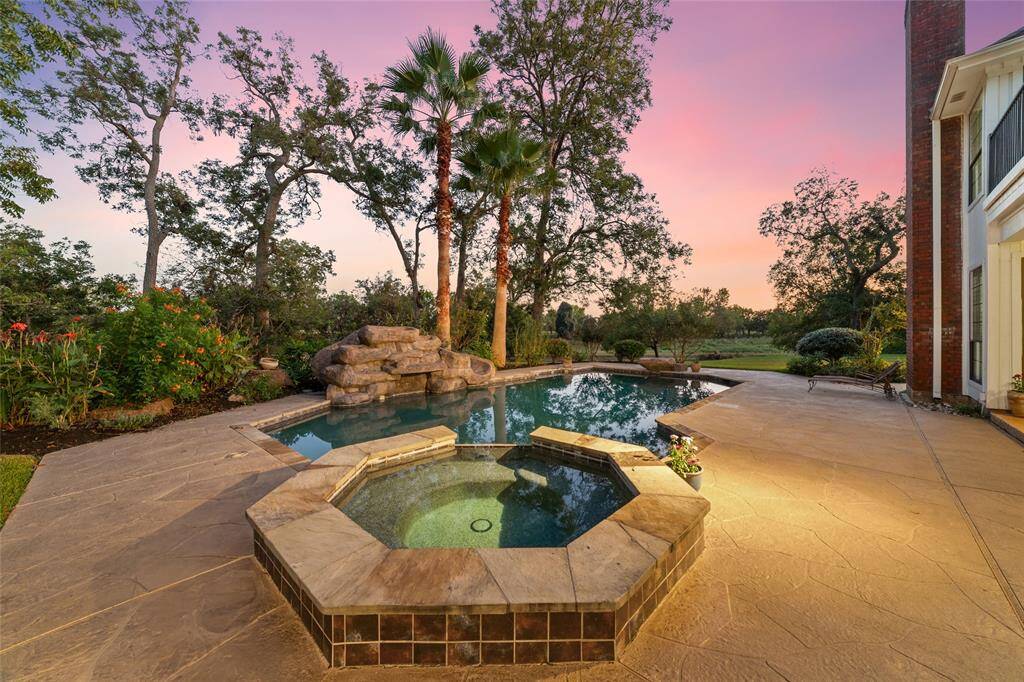 Take in the breathtaking view from this backyard, where nature truly shines! Surrounded by vibrant greenery and open skies, this peaceful outdoor space invites you to experience the beauty of the natural world right from your home.