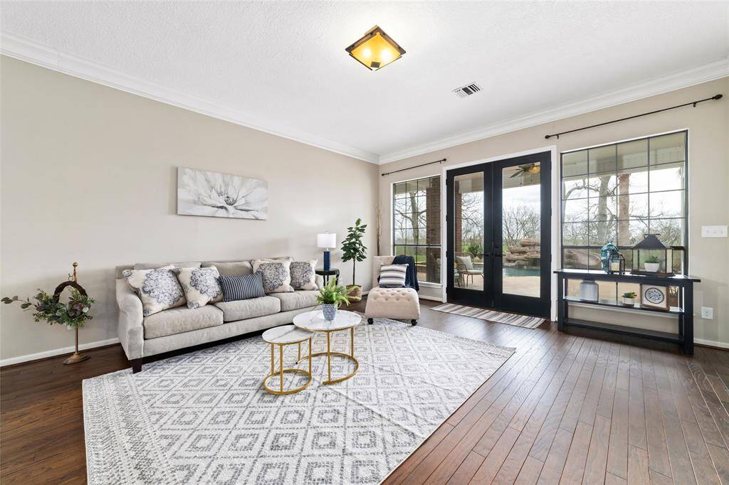 Another view of this beautiful living room with tons of natural light and fabulous views!