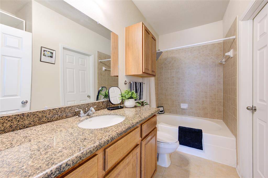 Master bedroom includes a tub/shower combo