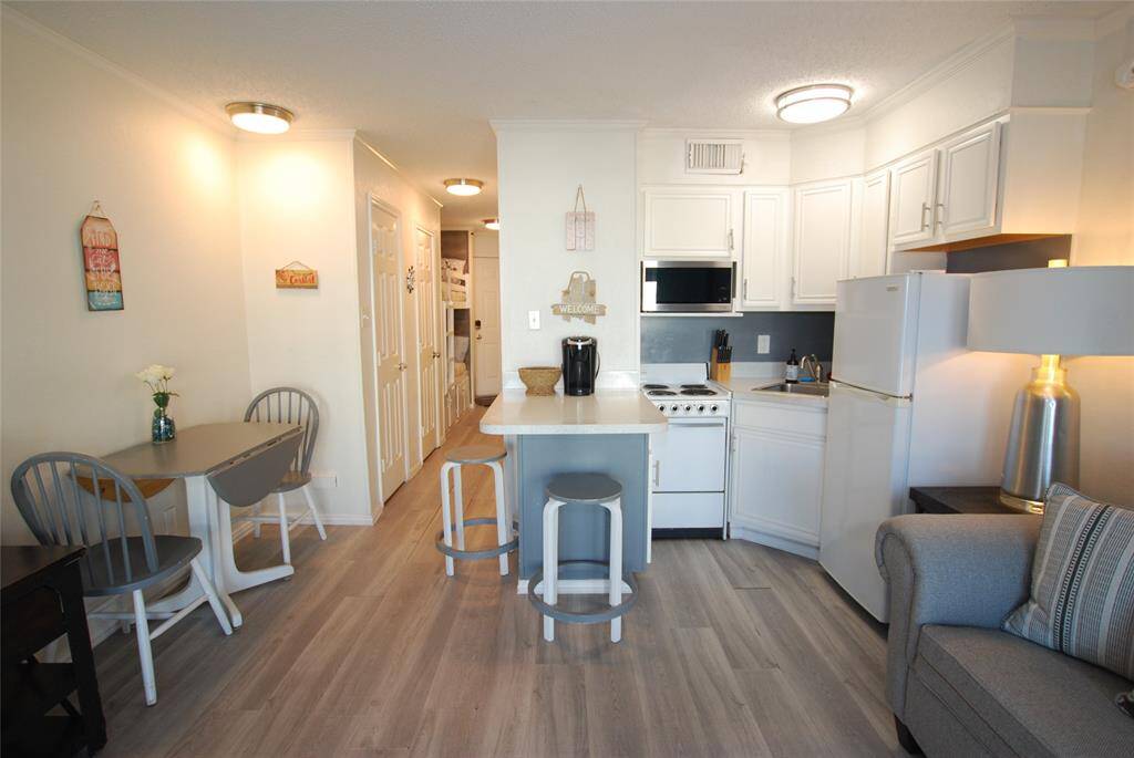 Kitchen and dining area is open to living space.