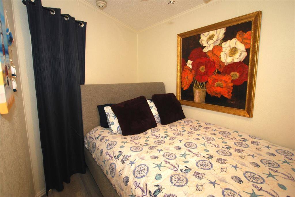 Cozy bedroom in the back.