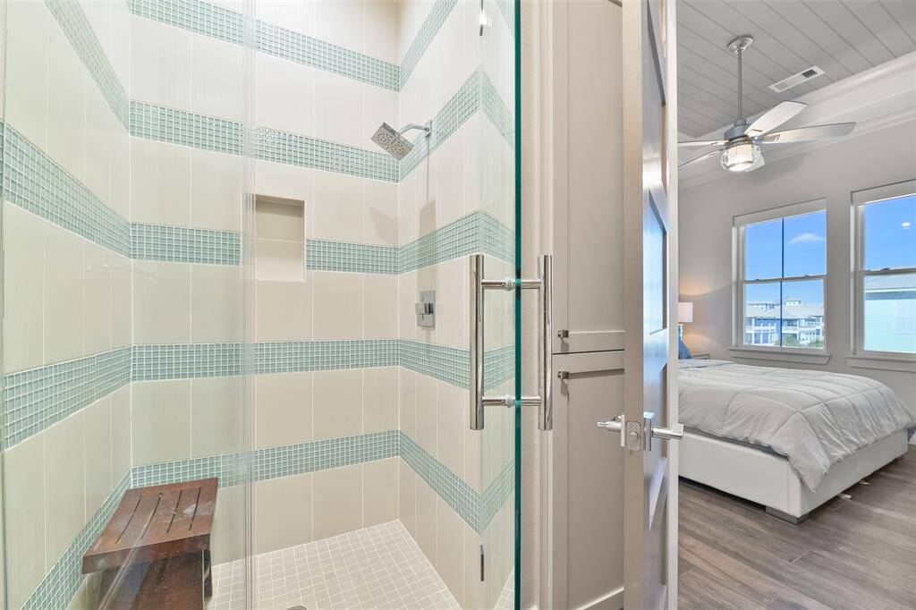 The spacious ensuite shower offers ample room for both comfort and luxury in this beautifully designed bathroom. It’s the perfect addition to this already impressive space.