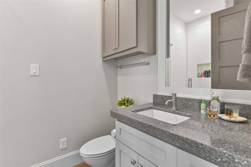 Each bedroom in this luxurious home features its own ensuite full bathroom, offering privacy and convenience with beautifully designed custom finishes throughout.