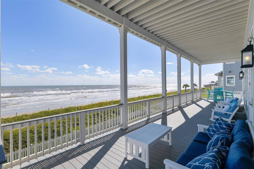 Step onto this expansive back porch featuring high-end low-maintenance TREX decking and soak in panoramic beach views, perfect for enjoying both morning sunrises and stunning sunsets. This is coastal living at its finest, where the breeze is sweet and the views are picturesque.