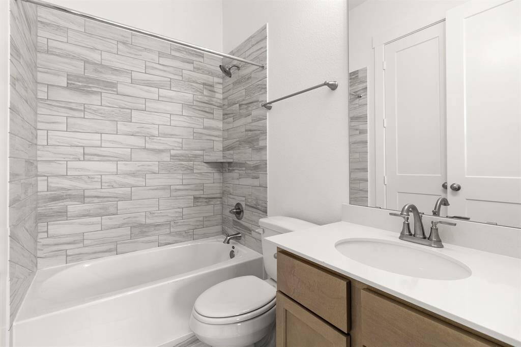 With its peaceful ambiance and separate bath, this room is perfect for guests or a cozy pe