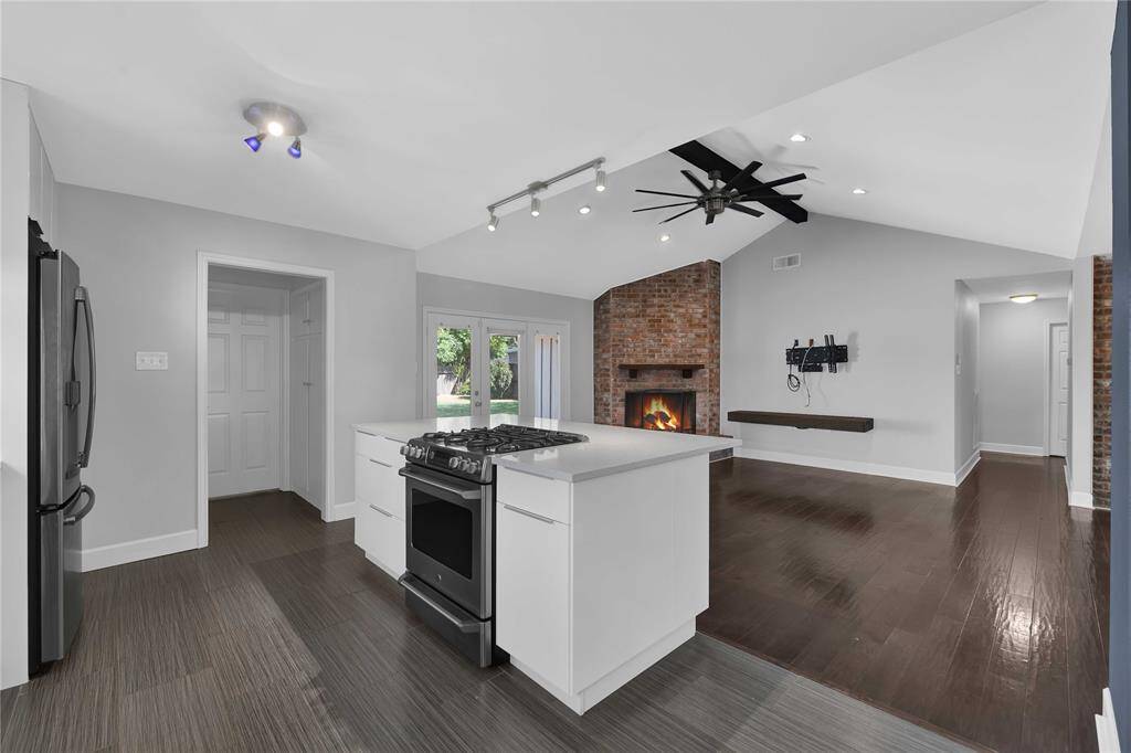 Seamless flow from the modern kitchen to the cozy family room, perfect for entertaining.