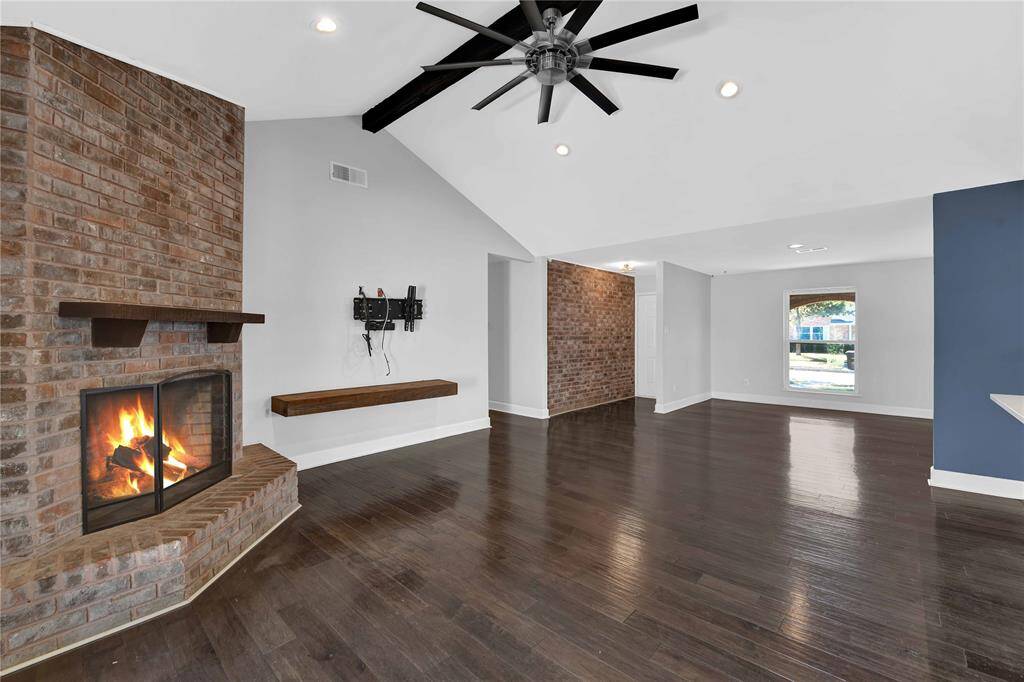Inviting Family Room with Cozy Fireplace (Virtually Lit)