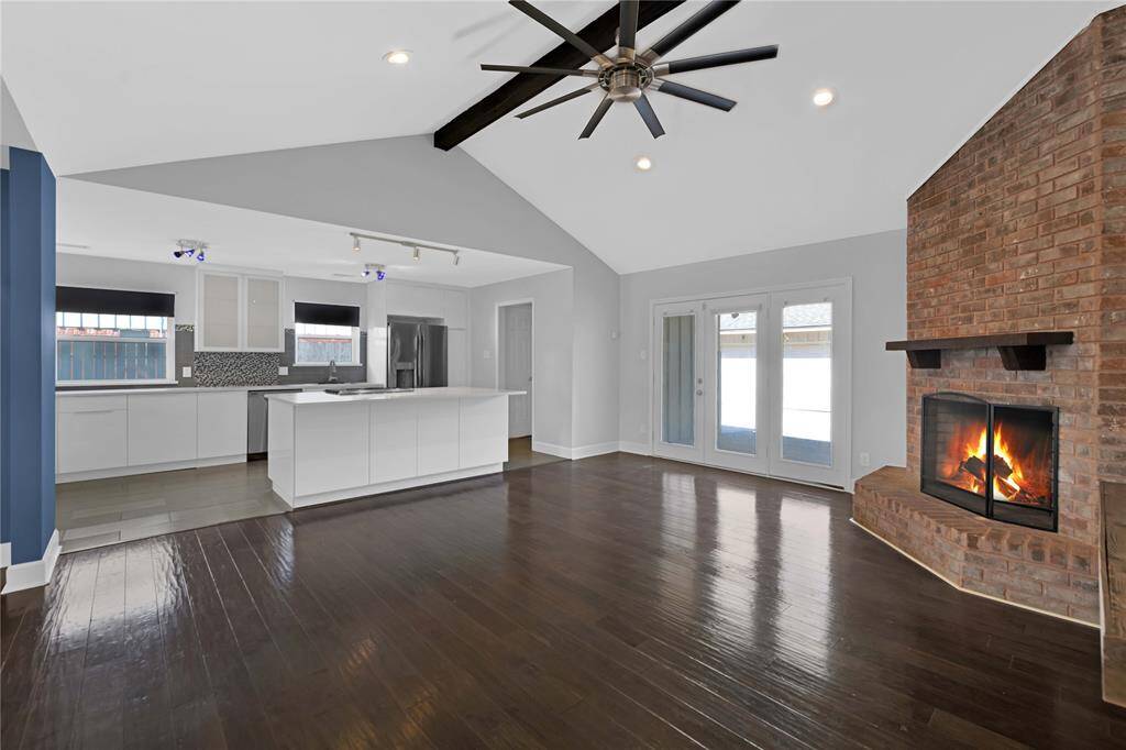 Inviting Family Room with Cozy Fireplace (Virtually Lit)