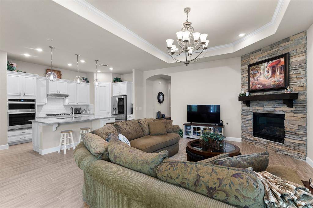 Open spacious floor plan with stone fireplace