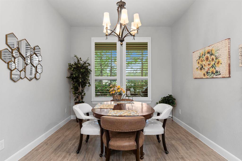 Notice plantation shutters in breakfast area