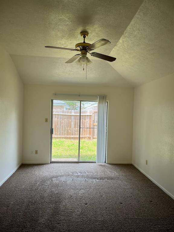 Third bedroom with ceiling fan