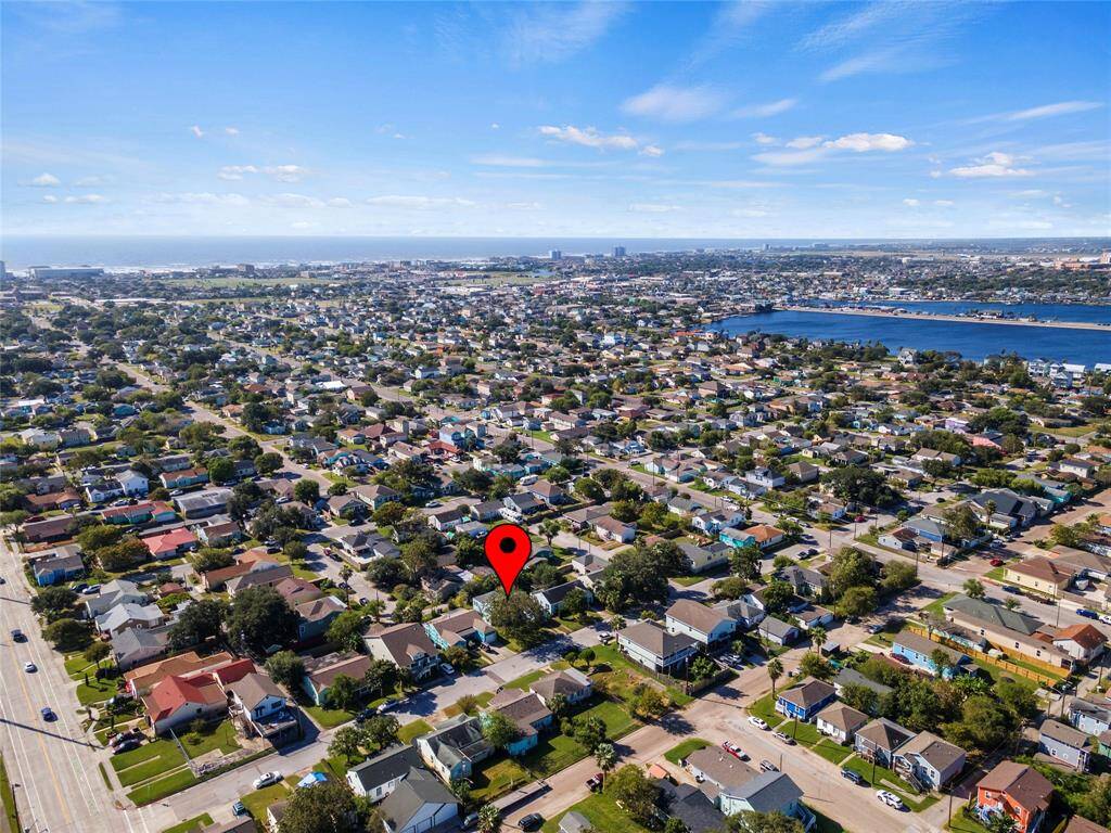 The neighborhood is well-established and is situated within walking distance to the beach, offering a blend of suburban living with proximity to the Gulf of Mexico