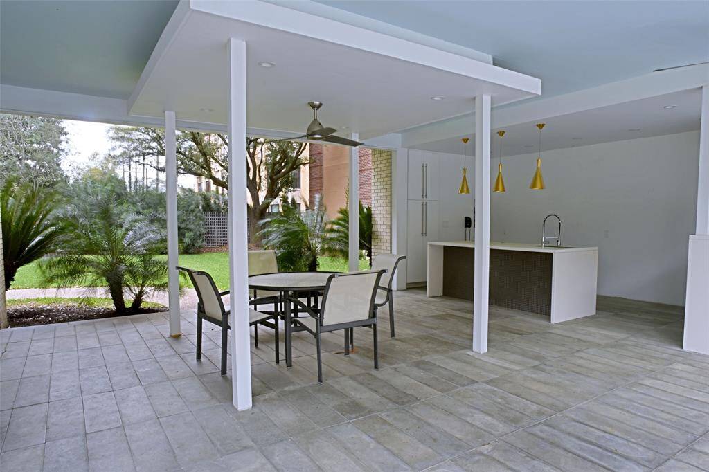 Outdoor Kitchen with Grill off to the side.