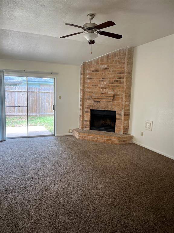 Corner wood or gas burning fireplace, cathedral ceilings with ceiling fan