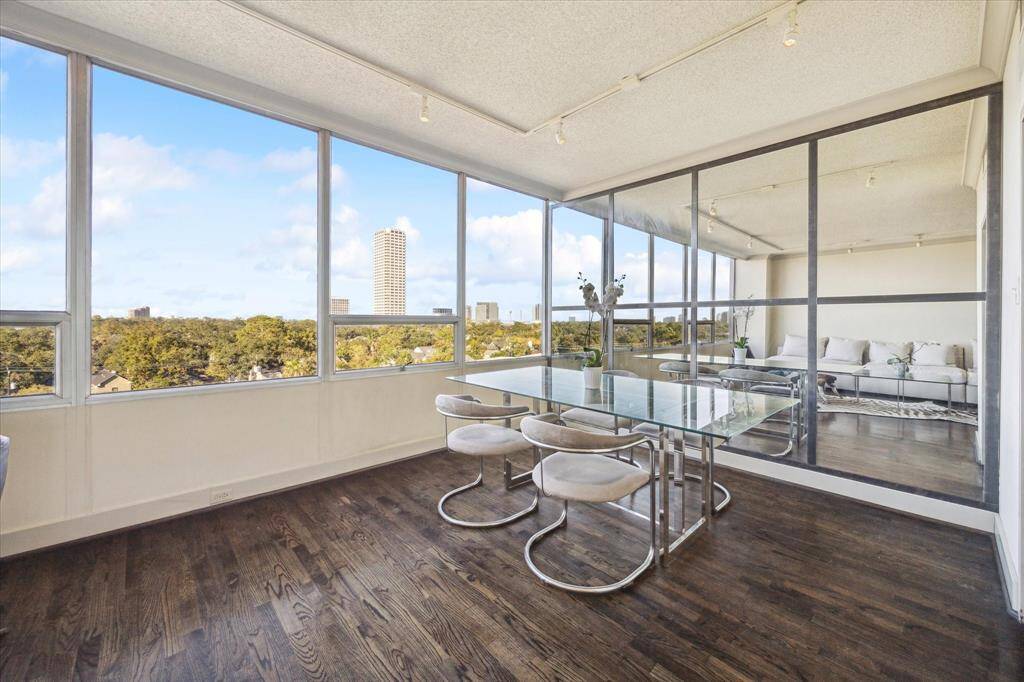 Dining Room with accent Mirror wall.