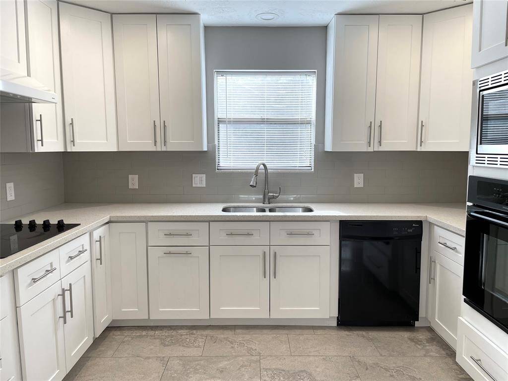 Recently remodeled Kitchen with white cabinetry