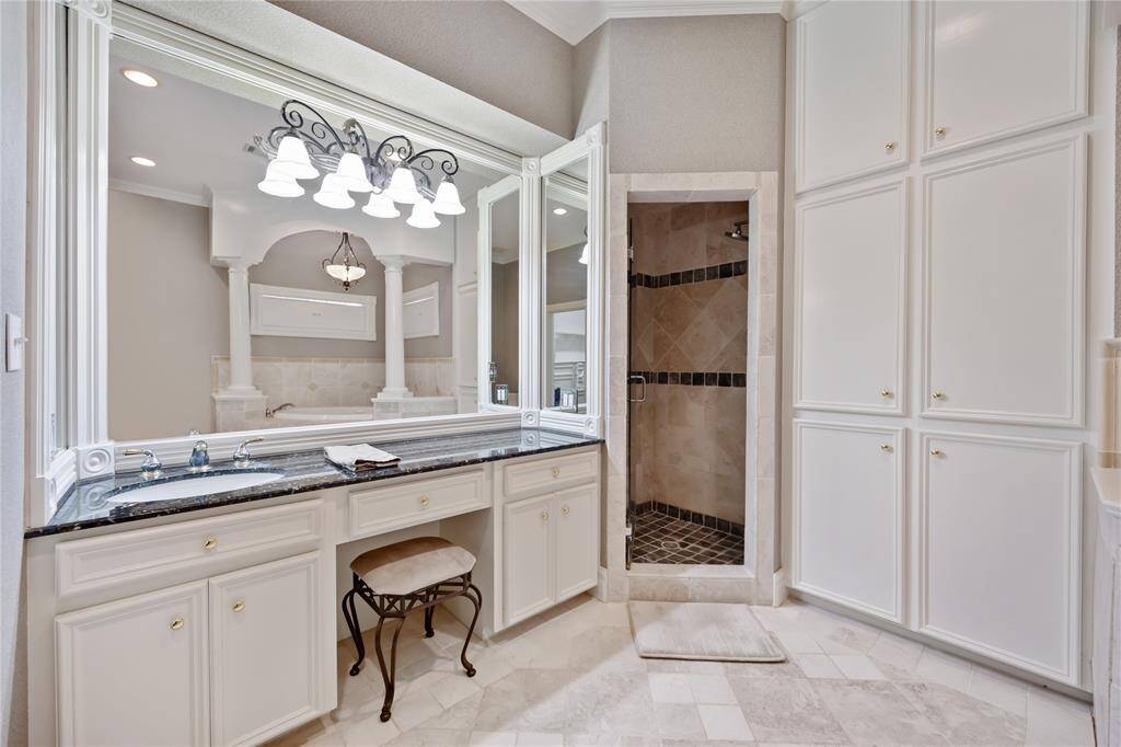 Main House Primary Bathroom. Separate Shower, Corner Soaking Tub and Stain glass Windows.