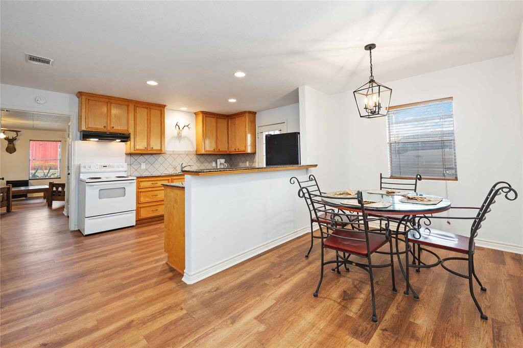 The guest house offers a full kitchen, breakfast bar, inside utility room, massive living room, dining room, office and bedroom.  All of this with private access.  Keep your family close while still independent.