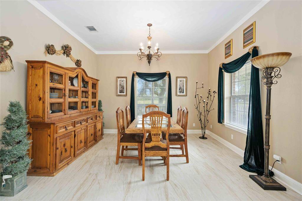 The dining room is 12x14. Think about the great Thanksgiving and Christmas gatherings you can have here.