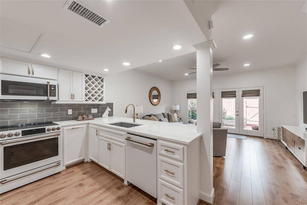 Wine rack and hidden garbage can in the kitchen