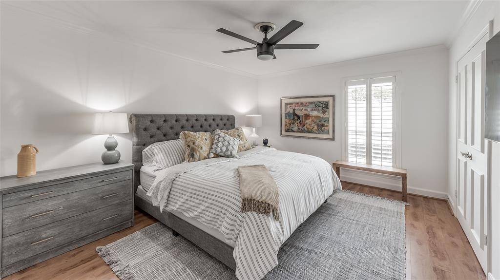 Primary bedroom with 55" Samsung Smart TV and king bed