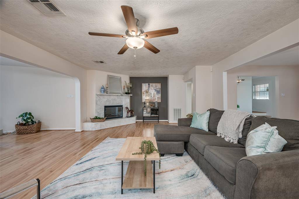 Another view of this awesome den area showing the ease of flow to other living spaces, ideal for entertaining or having gatherings.