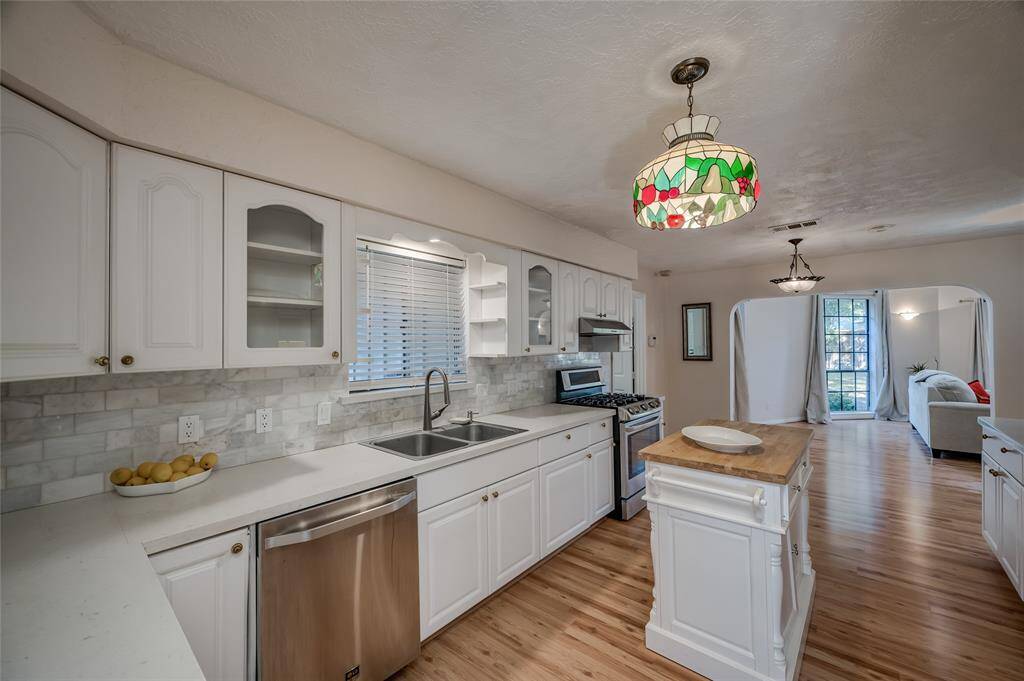 Quartz counters make this space feel warm yet modern for the ultimate ease of care.