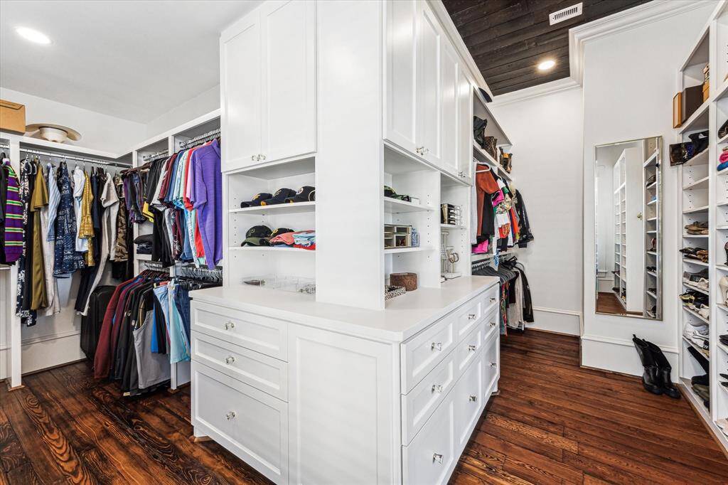 Master Closet: Custom cabinets/shelves and refinished ceilings.