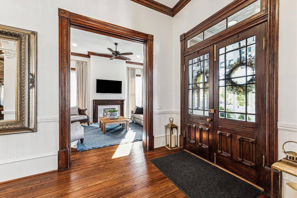 Parlor 1: Refinished original trim work and pocket doors/hardware has been restored. The original wood floors have been refinished twice to bring it back to its original beauty.