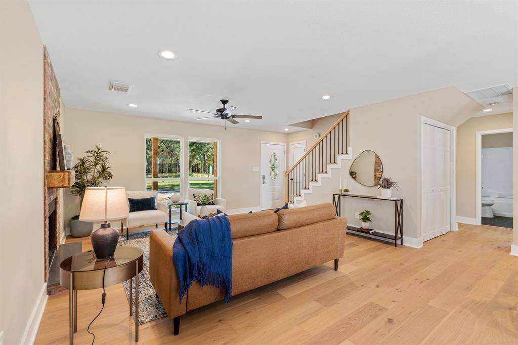 Another view of the bright andspacious living room.