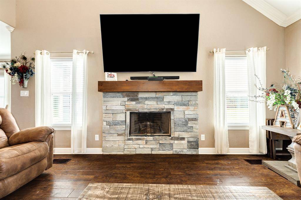 Living area with wood-burning fireplace