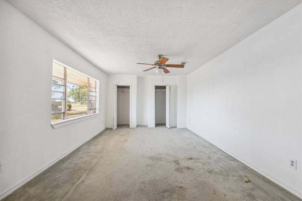 Bedroom with double closets
