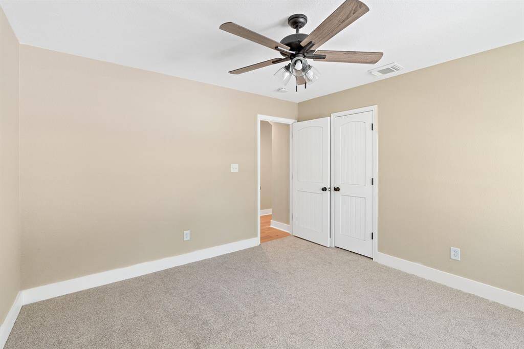 Third bedroom features large windows and plush brand new carpet.