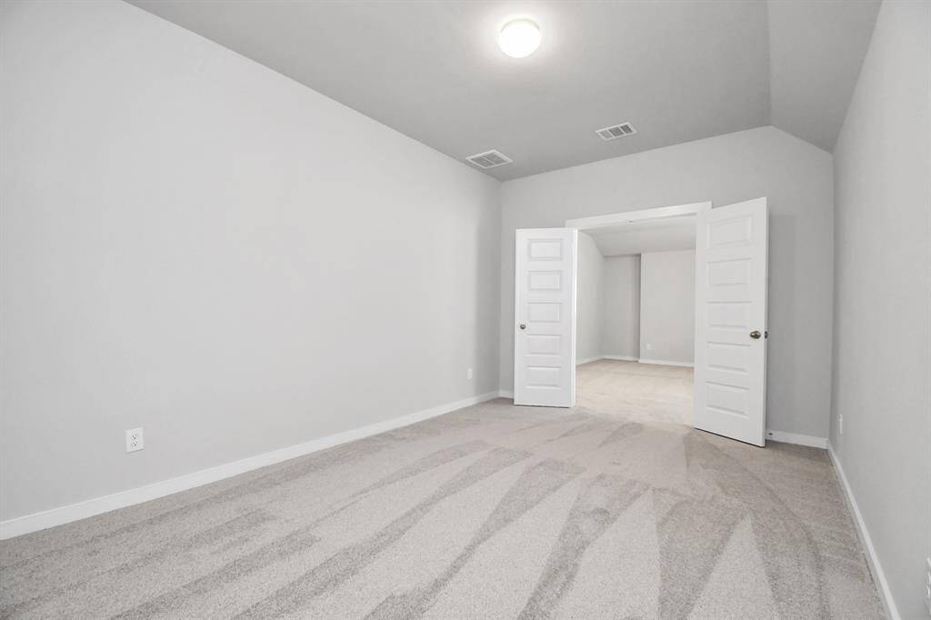 Media room right off the game room for all your entertaining needs.