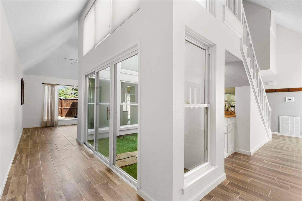 Going from the family room to the dining area, you'll pass the atrium at the middle of the home. Put plants, grown an herb garden or put pretty statuary here for a dramatic look