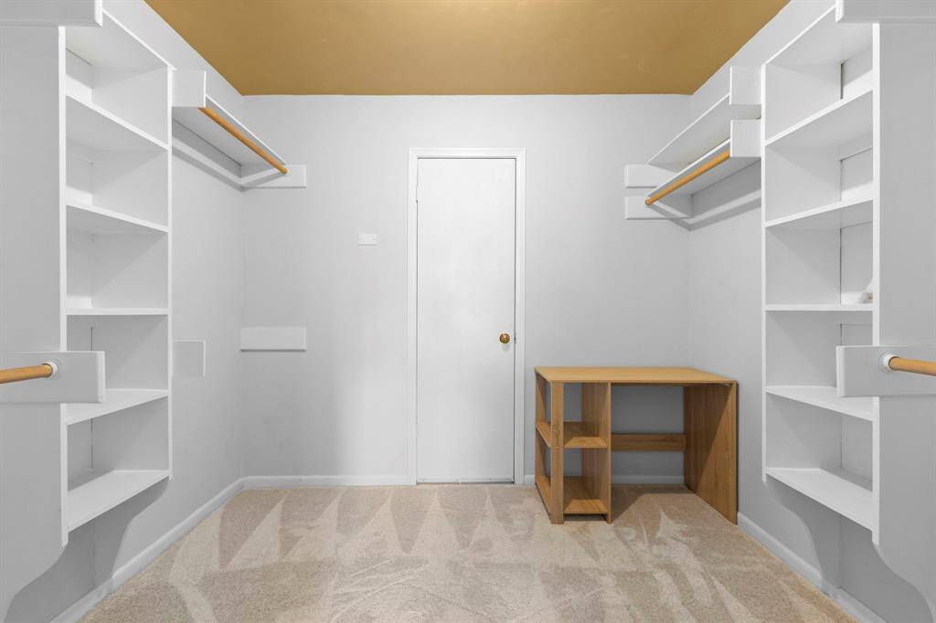 Wow! The closet for this room is awesome! The door leads to attic access.