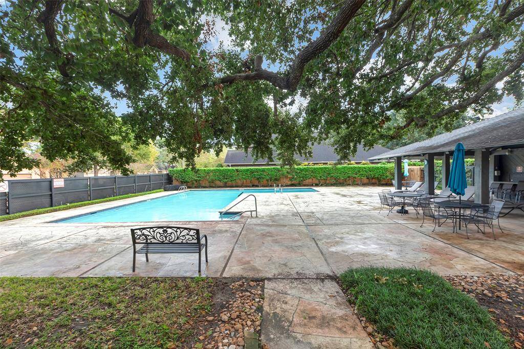 Community amenities include a pool with plenty of lounging area