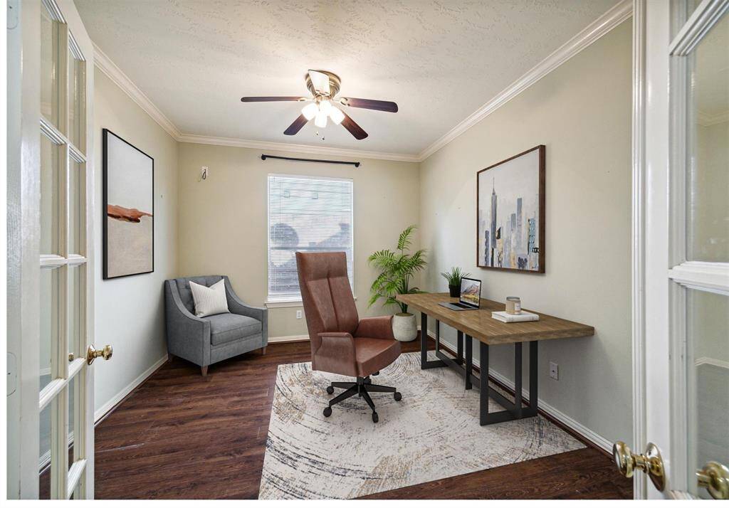 This is such a great flex space! Located between the living room and the primary sweet- It could be used for an office, a downstairs playroom, a nursery, or a workout room!