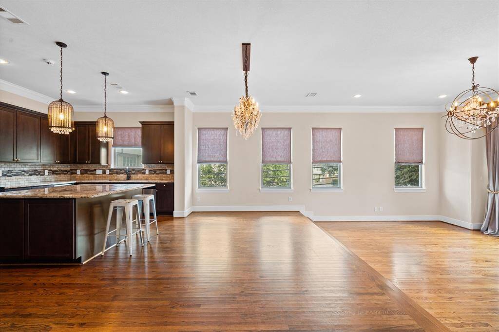 The lighting is high end as well as the Belgian linen shades and drapery!