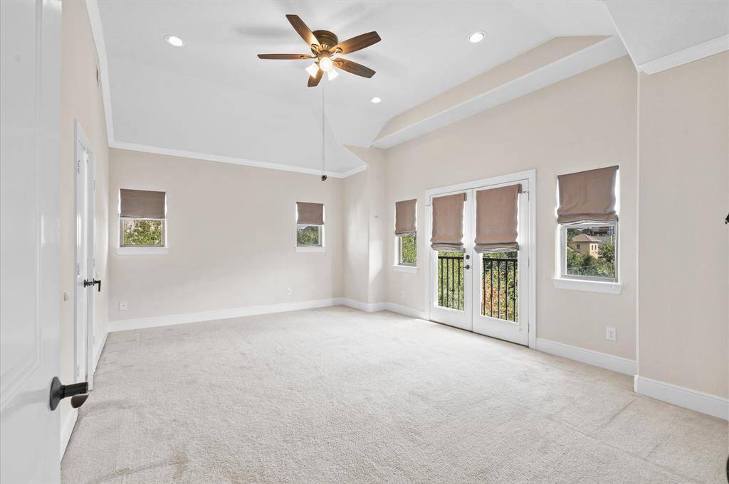 Grand spacious primary suite with tall ceilings and Belgian linen shades!