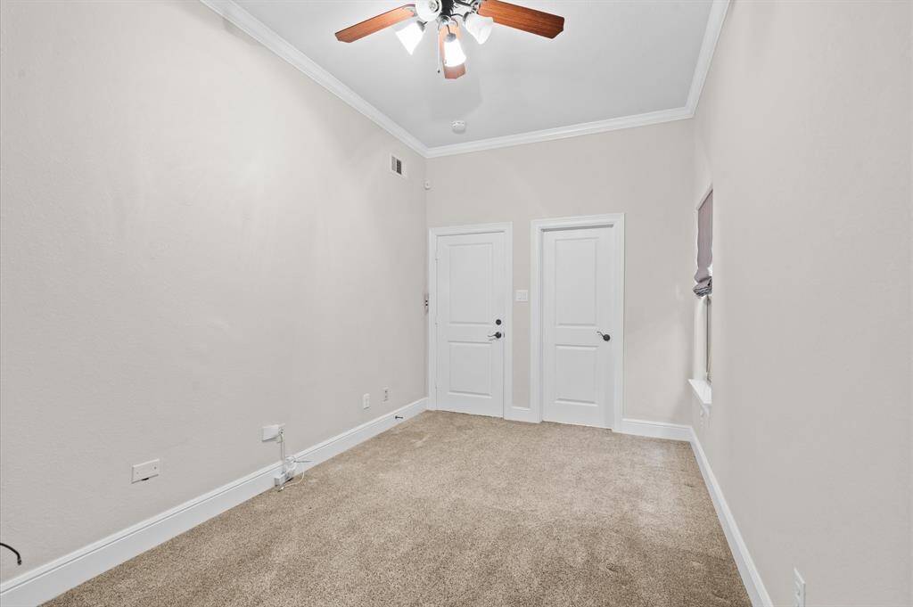 Spacious oversized rooms with tall ceilings and moldings in this home!